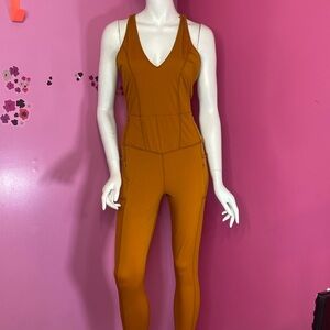 Free People Movement bodysuit burnt orange size medium-new
